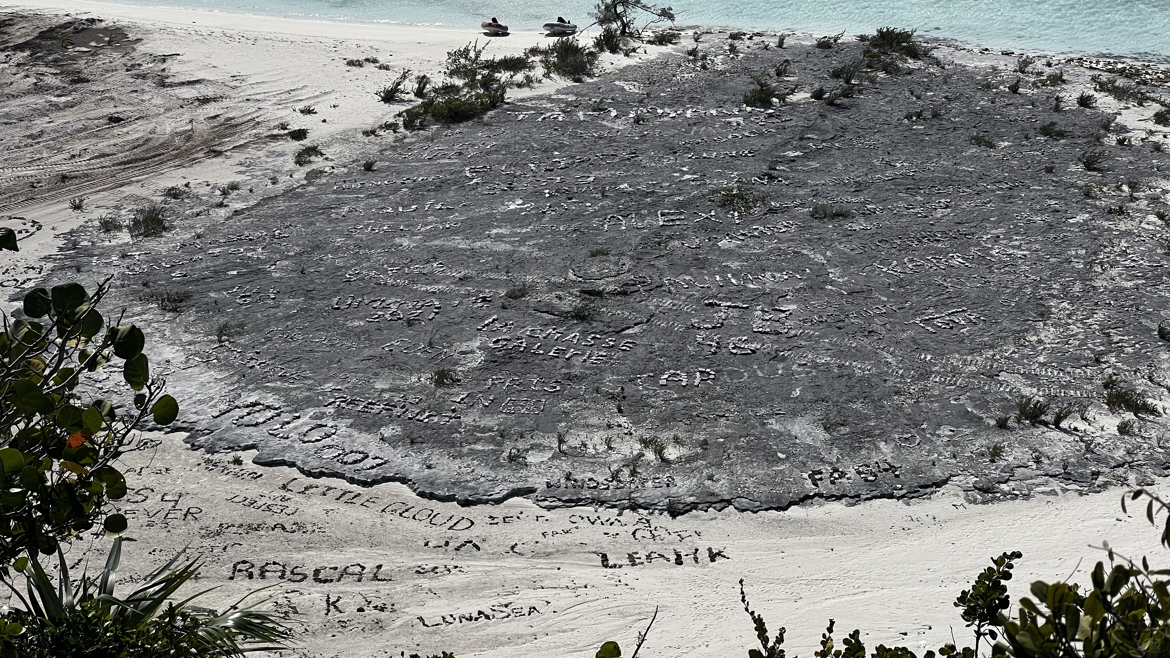 View from the top: boat names made of stones