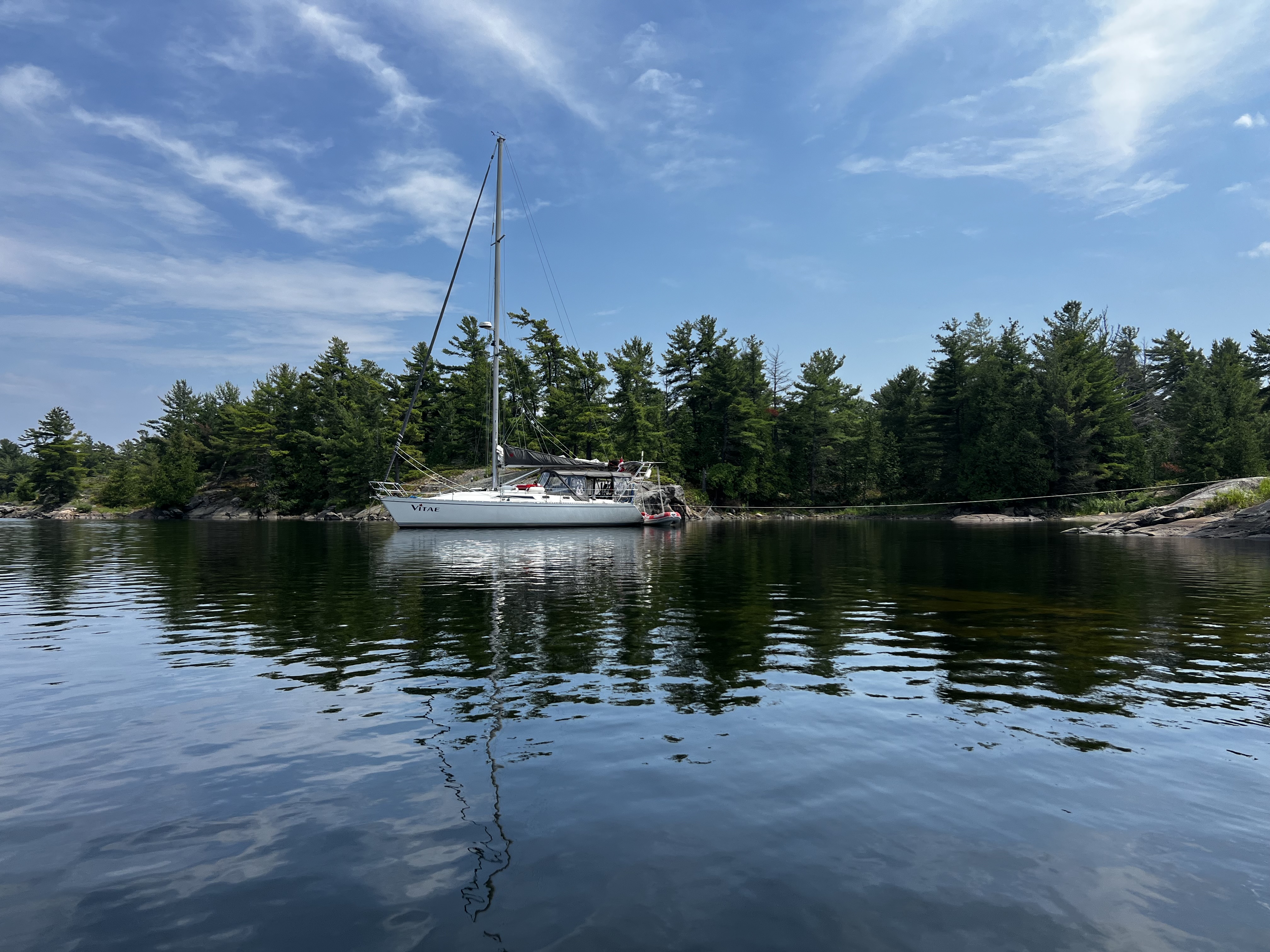 With the stern tied to shore